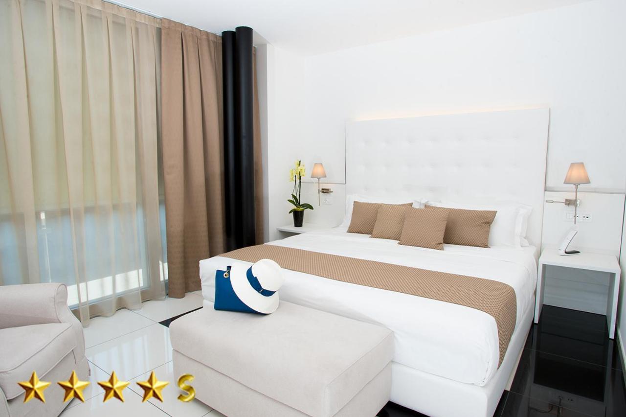 Hotel Rossini 4S ลินญาโน ซับเบียโดโร ภายนอก รูปภาพ